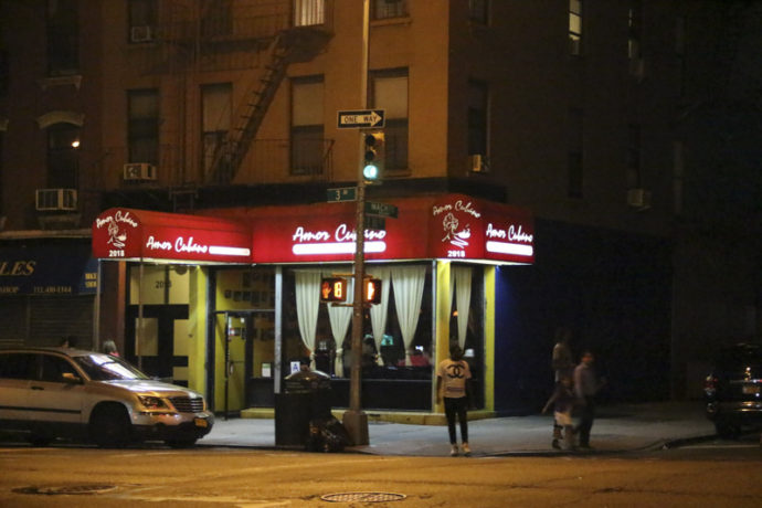 Amor Cubano Restaurant at night. Located at East 111th Street and Third Avenue.