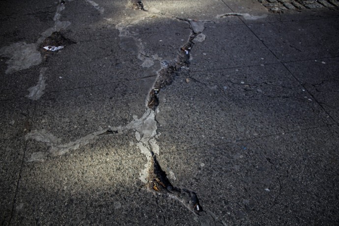 A crack in the street.