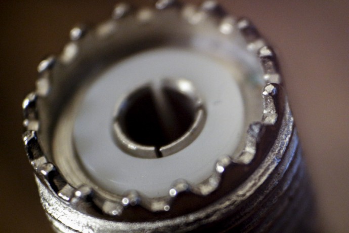 A close up view of an SO-239 which is a female coax cable connector.