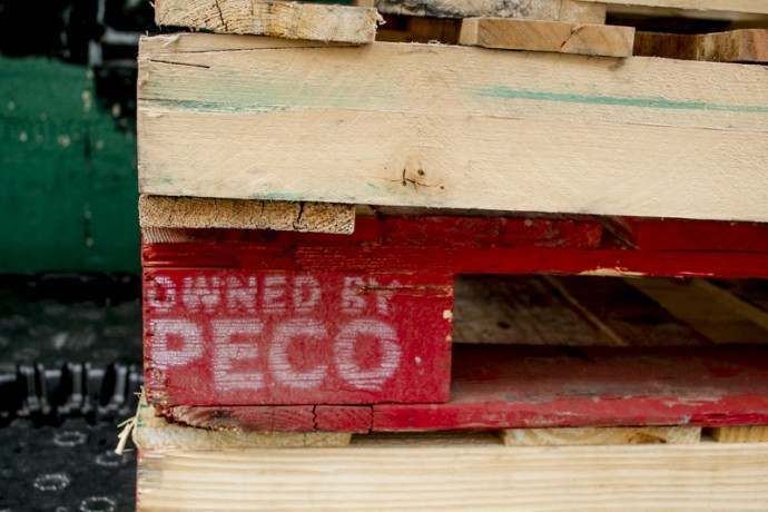 Close up of wooden palette outside of supermarket at East 110th Street between Lexington and Third Avenues.