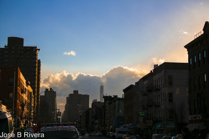 Clouds come thundering down Third Avenue and East 110th Street.