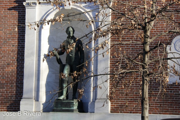 Statue on an outer wall of the Museum of the City of New York.