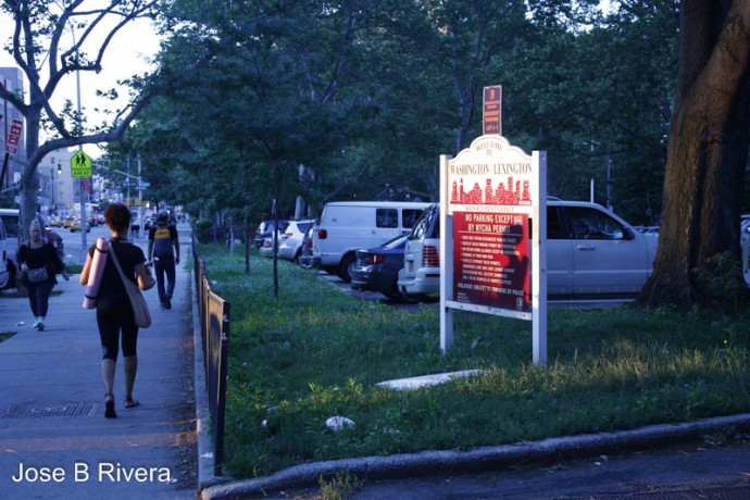 Sun was setting and I caught this lady's shadow on the sign opposite her.