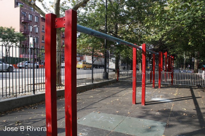 Playground near East 99th Street. Swings were being replaced. Hence the empty swings bar/structure.