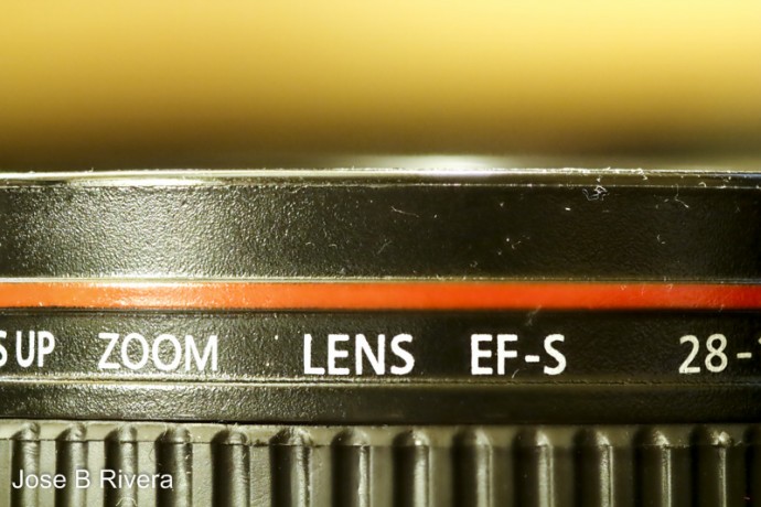 The lettering on my cold drink cup which looks like a camera lens.