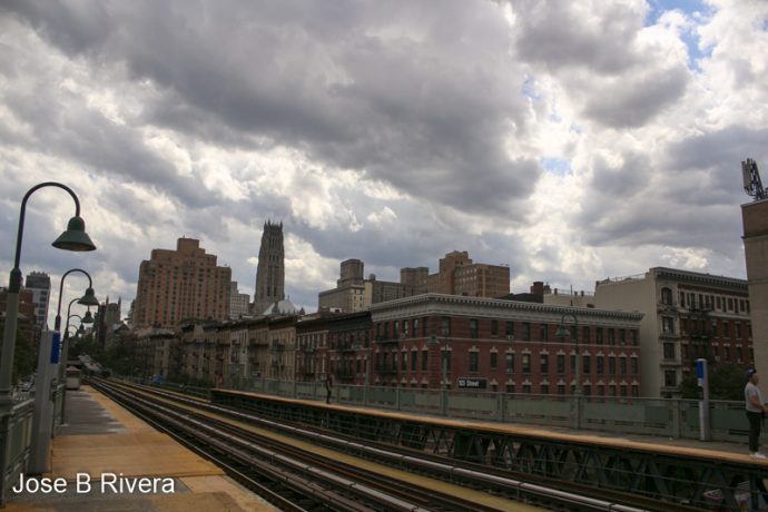 Clouds over tracks at 125th Street Train Station.