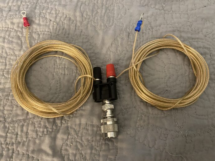 Completed Dipole Antenna. The antenna length is set for 20 meters, 14Mhz and is about 16 feet at each leg of wire.