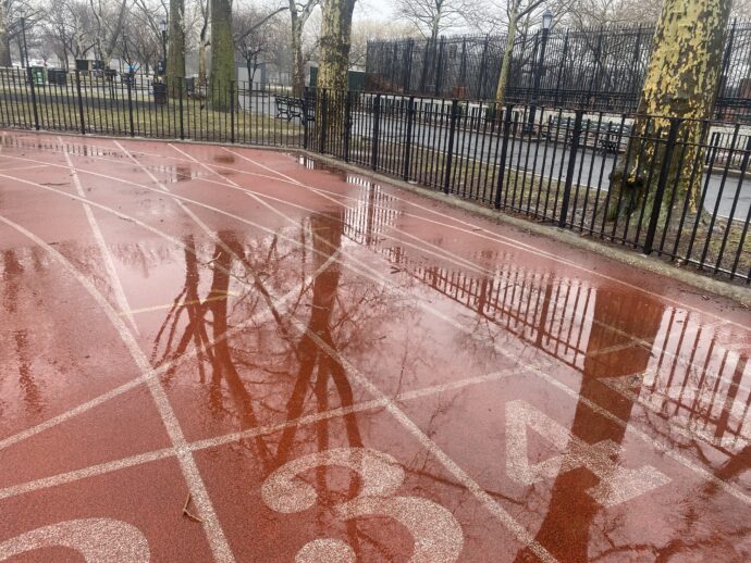 Photo of a wet track located in Jefferson Park between 114th and 113th Street between 1st and Pleasant Avenues.